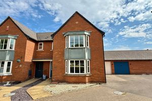 Front- White Garage- click for photo gallery